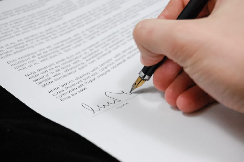 An Airbnb host reviewing legal documents and insurance policies to safeguard his property, an essential step in how to become an Airbnb host.