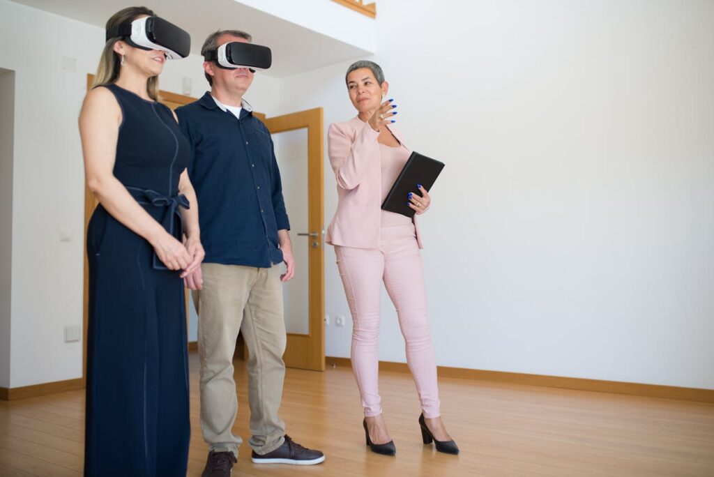 Property agent showing rental to clients using VR headset, innovative Airbnb arbitrage strategy.