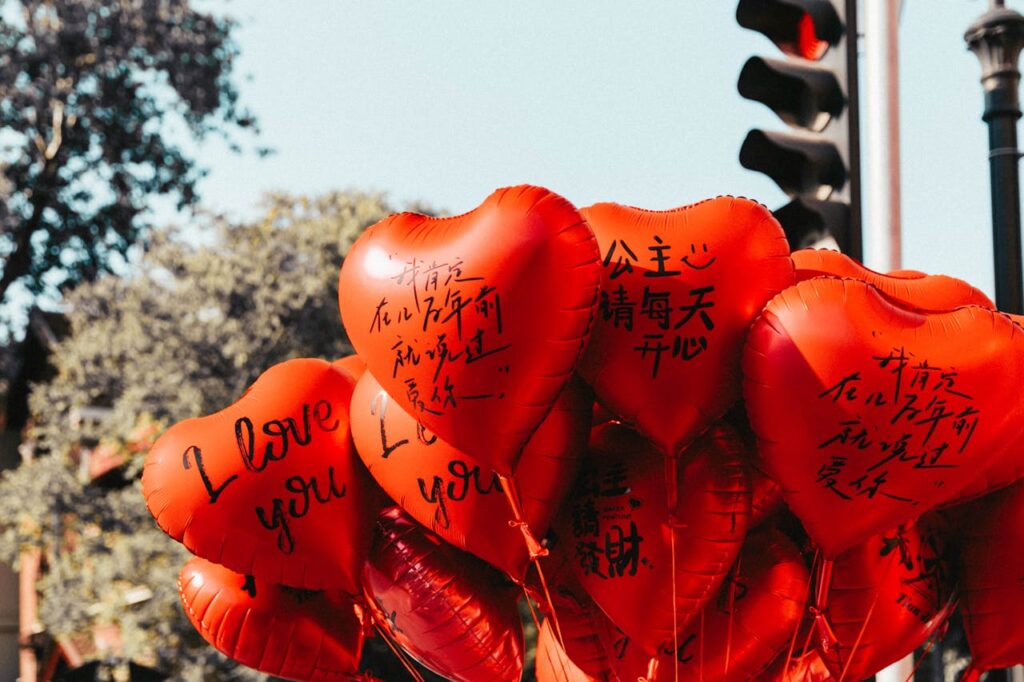 Red love balloons for romantic anniversary decoration at home and gifting purposes.