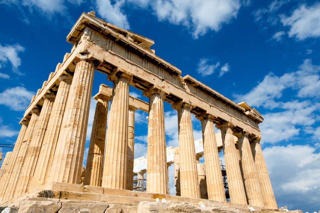 The Parthenon in bright daylight, a must-see landmark in any Greece travel itinerary.