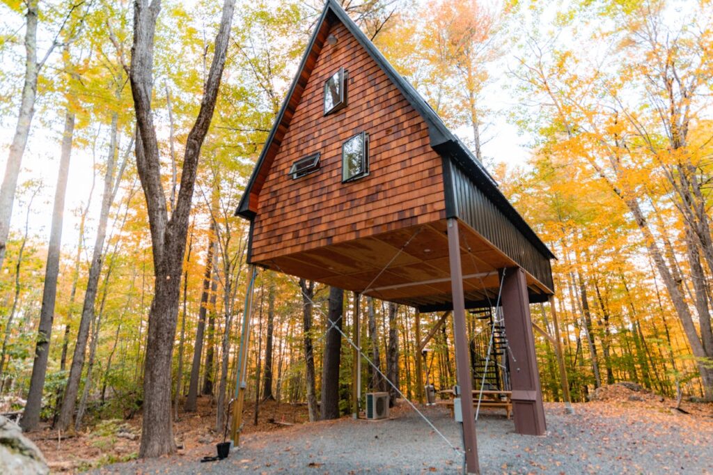 Stunning treehouse in the woods with a scenic view, perfect to get featured on Airbnb