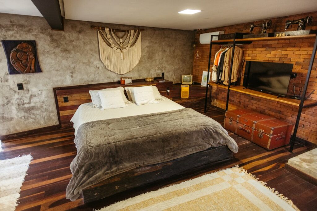 Retro-style bedroom with king bed and cozy linens, styled to get featured on Airbnb