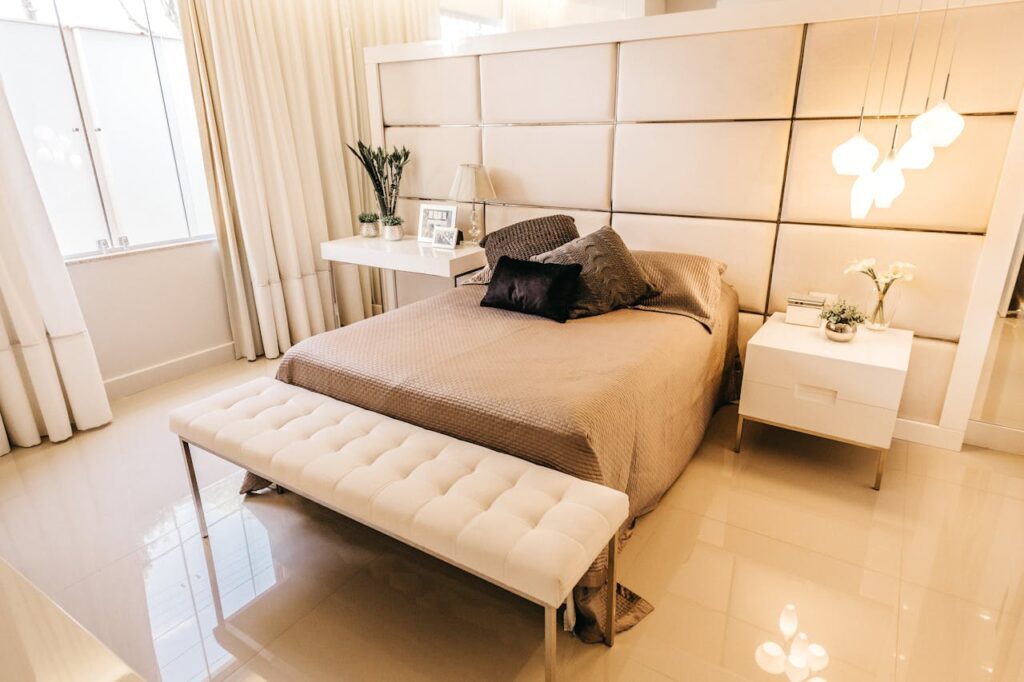 what does superhost mean on airbnb luxury bedroom with bright colors and stylish bedding