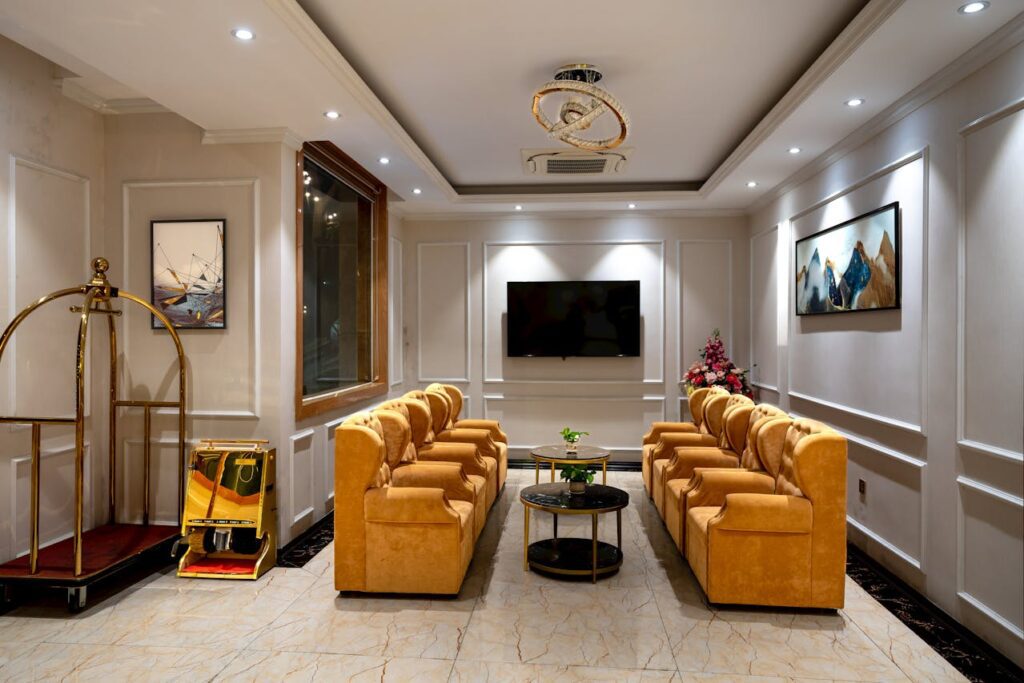 How to leave a review on Airbnb – Airbnb living room with camel-colored couches and LED TV